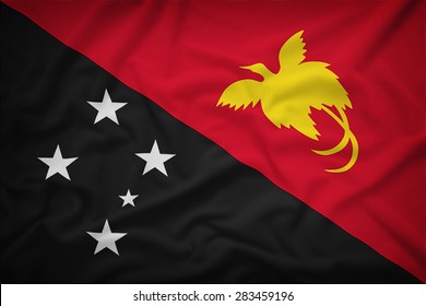 Papua New Guinea flag on the fabric texture background,Vintage style