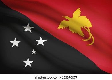 Papua New Guinean flag blowing in the wind. Part of a series.