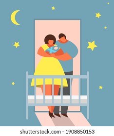 Parents Mom And Dad With Newborn Baby In The Bedroom Standing In Front Of Cradle Holding Child. Bedtime Lullaby, Moon And Stars On The Background. 