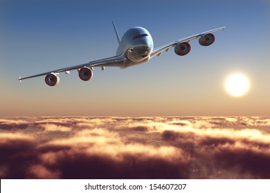 Passenger Plane Above The Clouds.