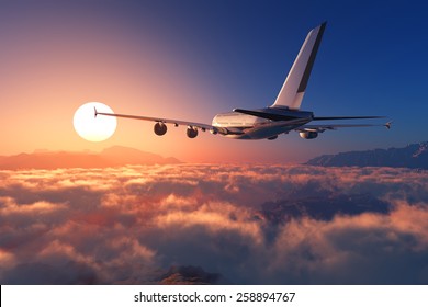 Passenger Plane Above The Clouds.