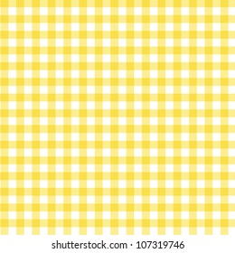 A pastel yellow gingham fabric background that is seamless
