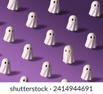 Pattern of ghost figurines on a purple background. Halloween Background
