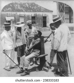 Paying The Death Penalty For Crime, Garroting A Criminal At Bilibid Prison, Manila, Philippine Islands, 1901.