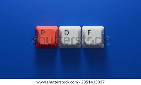 PDF.Computer keyboard keys spelling.Flat lay view from above on blue background with computer keyboard keys buttons.IT technology concept.3D rendering on blue background.
