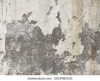 Peeling plaster Wall fragment with scratches and cracks.Distressed Yellow Brown Old Brick Wall With Graffiti Street Art.Background And Painted Lines And Draw.Abstract Grunge Modern Grafitty Wallpaper.