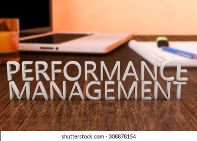 Performance Management - Letters On Wooden Desk With Laptop Computer And A Notebook. 3d Render Illustration.