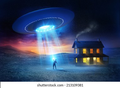 A person being abducted in front of his house.