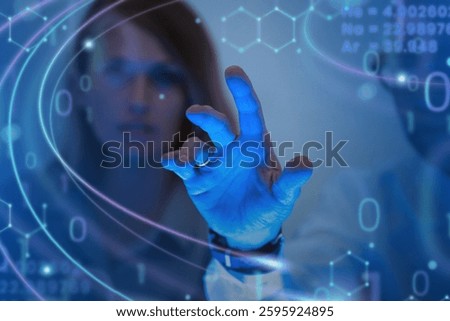 Person interacting with digital interface, blue tones, futuristic technology. Hand gestures, digital data, technology theme. Futuristic digital interface. Business and technology image.