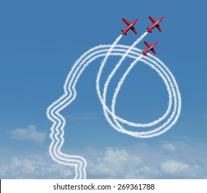 Personal achievement and career aspiration concept as a group of acrobatic jet airplanes performing an air show creating a human head shape for business vision success or learning potential metaphor.