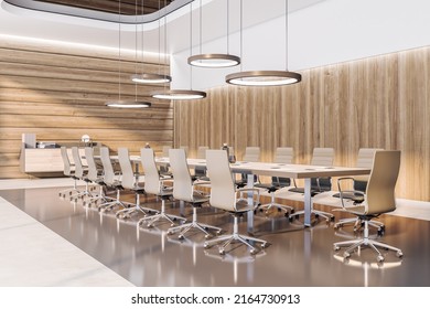 Perspective View On Sunny Stylish Spacious Conference Room With Modern Round Lamps Above Huge Wooden Table Surrounded By Beige Chairs, Wooden Walls And Glossy Floor. 3D Rendering