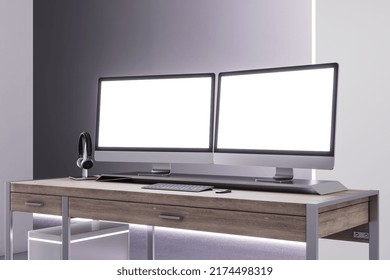 Perspective view on two blank white illuminated monitor screens with place for your logo or text on light wooden office table on light wall with purple backlit background. 3D rendering, mock up
