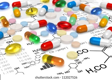 Pharmacy concept: macro view of heap of color pills and tablets over chemical formulas on white background