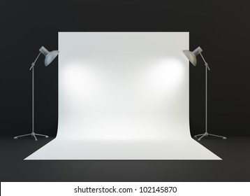 A Photography Studio With A Light Set-up And Backdrop