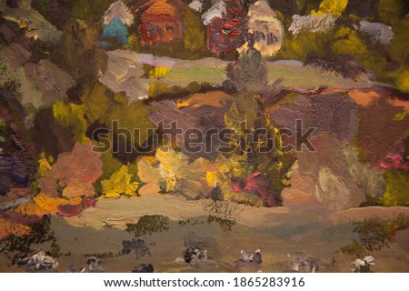 Picturesque landscape overlooking the village,cows graze in a field surrounded by ravines.Oil painting.