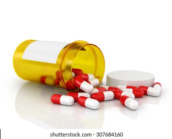 Pills Spilling Out Of Pill Bottle Isolated On White.