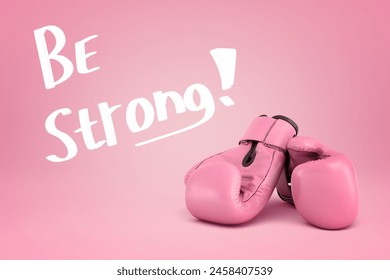 Pink boxing gloves with motivational text. 3D Illustration - Powered by Shutterstock