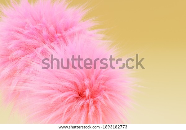  Pink fur balls on a yellow background, 3d render