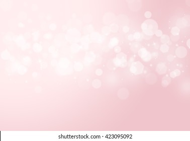 Pink sparkles glitter and rays lights bokeh abstract valentine background/texture.