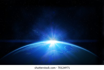 Planet earth with sunrise in space - Shutterstock ID 70124971