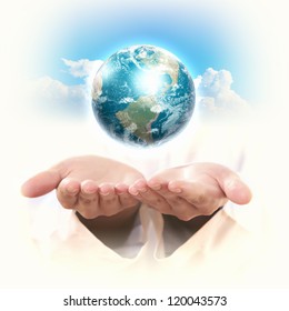 Planet System in Your Hand. Conceptual Image. Elements of this image are furnished by NASA