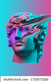 Plaster sculpture of young man face in a pop art style. Statue of Antinous head. Creative concept colorful neon image with ancient roman sculpture Antinous head. Cyberpunk, webpunk and surreal style.