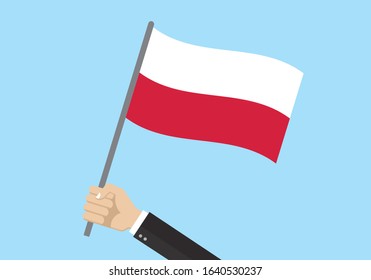 Poland Waving Flag. Hand Holding Polish Flag. National Symbol.