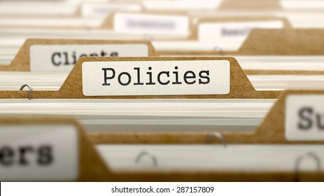 Policies Concept. Word on Folder Register of Card Index. Selective Focus.