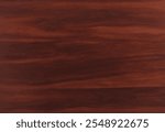 Polished mahogany surface with a deep reddish-brown tone.