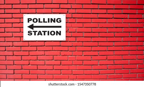 Polling Station Sign On Red Wall