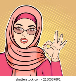 Pop Art Happy Arab Woman In Hijab Smiling And Showing Ok Sign, Illustration Of Successful Muslim Woman In Retro Comic Style