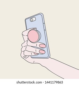 Pop Socket Phone Holder In Woman Hand. Ring Holder For Phone Pop Socket. Smartphone Accessory Holder. Suction Cup Ring For Phone