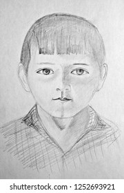 Portrait Of A Five Year Old Boy. Pencil Drawing On Paper