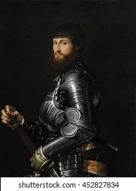 Portrait Of A Nobleman In Armor, By Anonymous Artist, C. 1540-60, Italian Renaissance Painting, Oil Paint On Canvas. Italian Nobleman In Armor, With Both Hands On The Hilt Of A His Sword