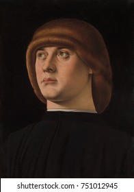 PORTRAIT OF A YOUNG MAN, By Jacometto, 1480s, Italian Renaissance Painting, Oil On Wood. The Distinctive Hairstyle, Zazzera, Was Fashionable In Venice In The Late 15th Century