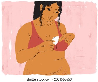 Postpartum Breastfeeding Mother Putting Lactation Pad In Bra