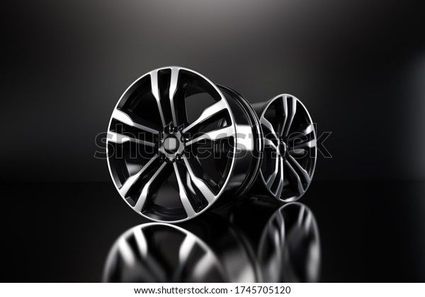 Powder coating of black wheel disk on black\
background. 3D rendering\
illustration.