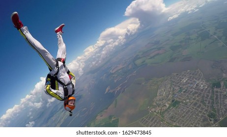 Power Australia. Skydiver Conquers The World. Skydiving Team Use Professional Equipment. Extreme Sport For Young Men.