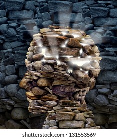 Power of thinking and free your mind as a business or health care concept with a group of rocks in the shape of a human head glowing with a bright inner light as a symbol of freedom and intelligence.