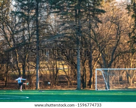 Practicing by himself, a young man kicks a soccer ball toward a goal on synthetic turf in a public park on a winter day without snow in northern Illinois, USA, with digital oil-painting effect