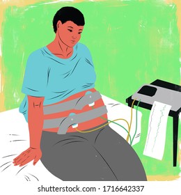 Pregnant Woman In Early Stages Of Labor Wearing A Fetal Heart Monitor