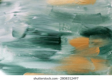 Premium emerald green painted texture accented with metallic gold brush strokes. Rich handcrafted acrylic background perfect for branding, luxury packaging, editorial layouts, web banners and elegant design projects.