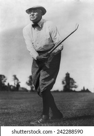 President Warren G. Harding (1865-1923), Swinging Golf Club.