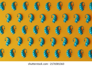 A presley pattern composed of blue balls on an orange background. 3d rendering, 3d illustration.