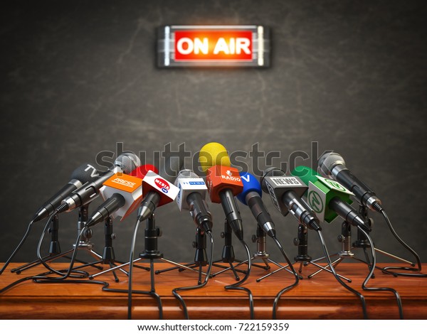 Press conference or interview on air. \
Microphones of different mass media, radio, tv and press prepared\
for conference meeting. 3d\
illustration.