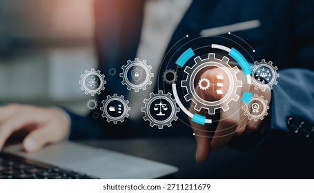 Process optimization concept, hand pointing digital gear system icons, workflow efficiency improvement, strategic planning, organizational development, productivity enhancement solutions.