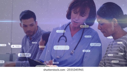 Processing medical data image, healthcare professionals reviewing patient information in office. consultation - Powered by Shutterstock