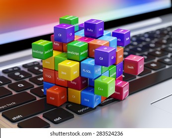 Programming concept. Different machine code languages colorful boxes on the laptop computer keyboard - Powered by Shutterstock