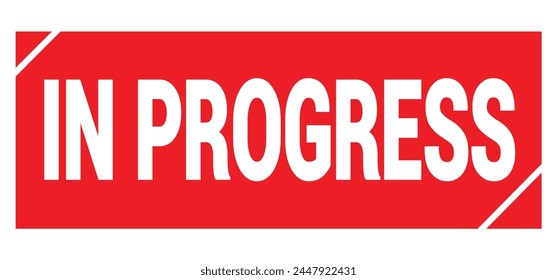 IN PROGRESS text written on red grungy stamp sign.
