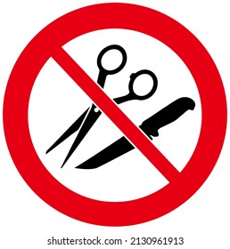 A prohibition sign that means : no scissors no knives 